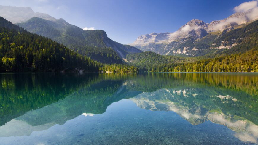 A landscape of a lake and mountains